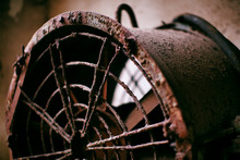 Old Iron Fans Are Full Of Rust And A Lot Of Thick Dust. Tools For Old Industrial Plants Abandoned For A Long Time.shallow Focus Effect.Retro Style.
