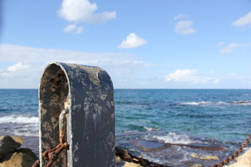 Boat anchor close up. A view of the Dead sea, Israel with a boat metal plate anchor. Boat steel cage near the sea.