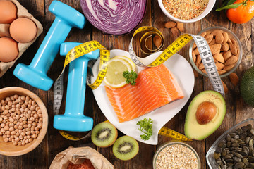 Wall Mural - health food- selection of healthy food with salmon, fruit and vegetable and dumbbell