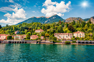 Wall Mural - Picturesque summer view from ferry boat of Cadenabbia town. Bright morning scene of Como lake, Italy, Europe. Traveling concept background.