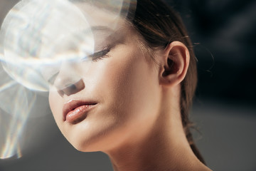 Wall Mural - portrait of attractive elegant girl on grey with lens flares