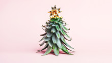 Pineapple Leaves In The Form Of A Christmas Tree With Decorations. Creative Christmas Concept. 2020 Year