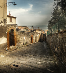 Wall Mural - Old street in a small town in Tuscany