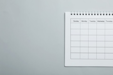 Sticker - Blank calendar on light grey background, top view. Space for text