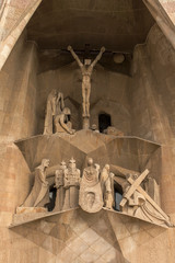 Detail of the external facade of the Sagrada Familia in Barcelona in Spain. The Cathedral is an important work of art designed by the architect Antoni Gaudi.