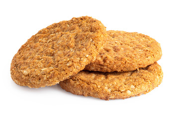 Wall Mural - Three crunchy oat and wholemeal biscuits isolated on white.