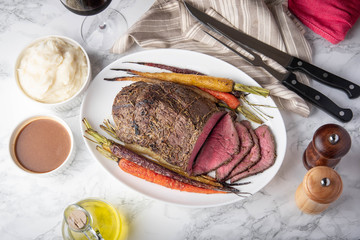 top round roast beef with carrot and mushed potato