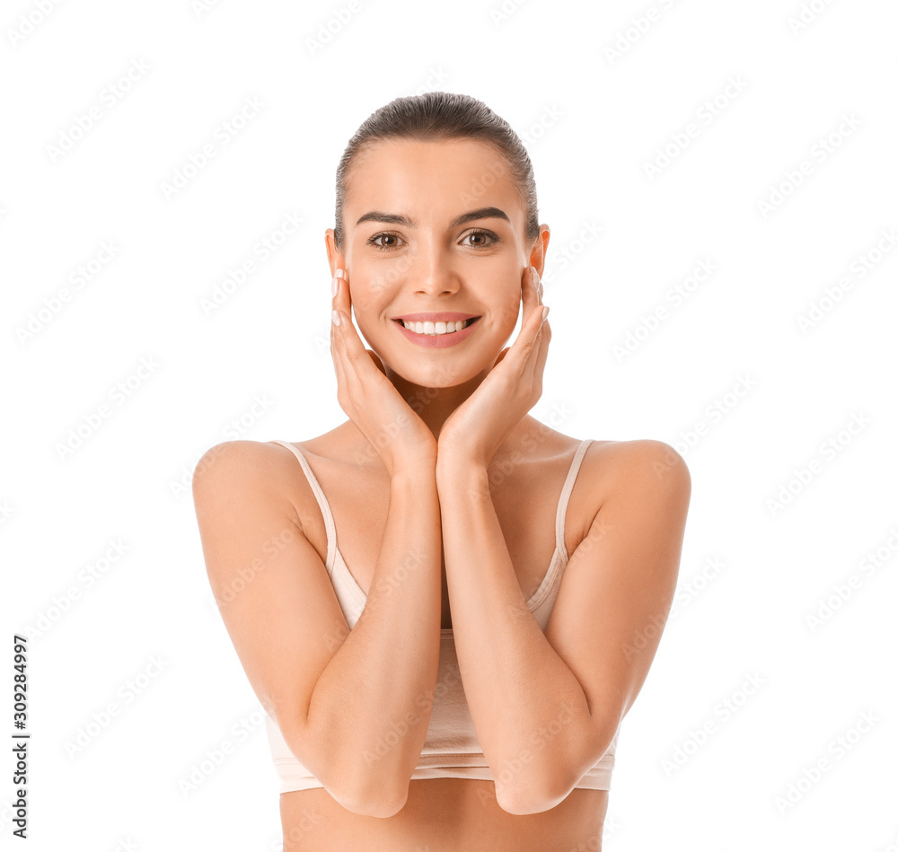 Beautiful young woman in underwear on white background