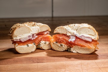 Wall Mural - Closuep shot of delicious bagels split into two parts - perfect for a food blog