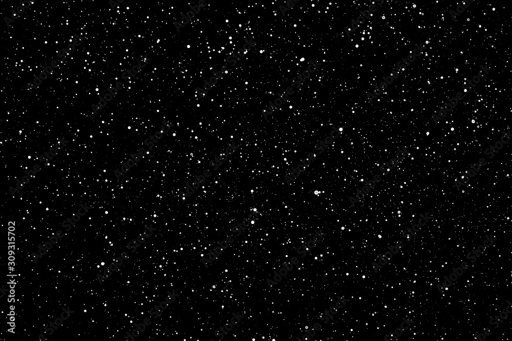 Chaotic white star bokeh on a isolated black background. falling blurry ...