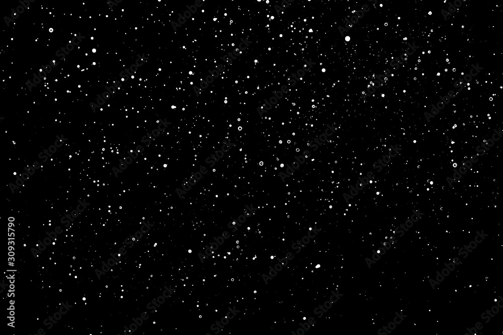 Chaotic white star bokeh on a isolated black background. falling blurry ...