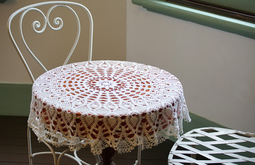 Wall Mural - Room chair and lace decorated table