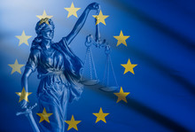 Statue Of Justice Over A European Union Flag