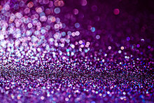 Purple Glitter Raster Festive Background. Abstract Violet Blurred Circles. Bokeh Lights With Bright Shiny Effect Illustration. Overlapping Glowing And Twinkling Spots Decorative Backdrop Design.