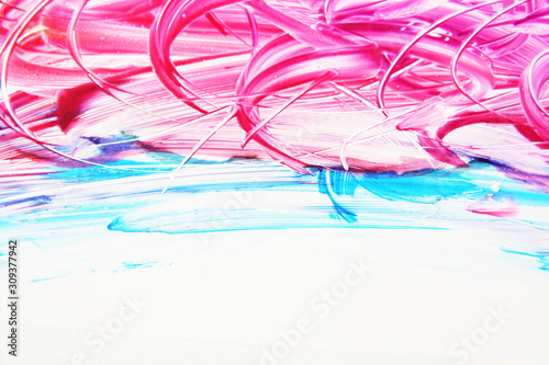 Abstract strokes of multicolored gouache on white paper for backgrounds
