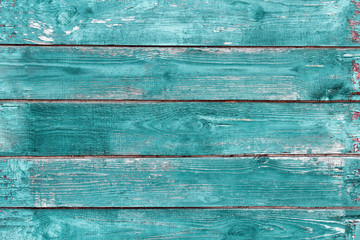 Vintage turquoise wood background or texture. Old mint color wooden wall