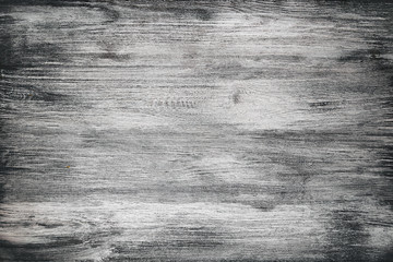 Black stained wood texture as background. Vintage wooden board as background