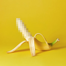 Natural Ripe Open Banana As A Symbol Of The Penis On A Yellow Background, Place For Text.