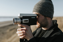 Man Holding 16mm Camera