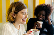 © Marco Govel/Stocksy - Two girl friends at a cafe