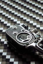 8mm Camera On Geometric Background