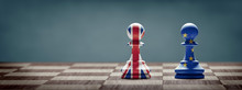 Brexit Concept. United Kingdom And European Union Flags On Chess Pawns.