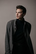 © Alberto Bogo/Stocksy - Dreamy man in stylish coat