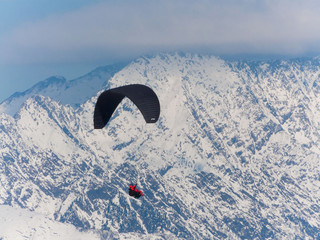 Wall Mural - Mountain winter, paraglider