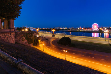 Wall Mural - Szczecin by night, city in Poland.  Popular boulevard on the Odra River