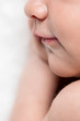 © Alison Winterroth Photography/Stocksy - Close up of a sleeping newborn baby