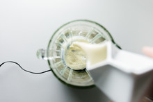 Pouring Soya Milk Into Glass Blender, From Above