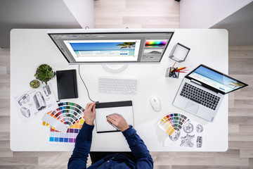Poster - Male Designer Working On Computer