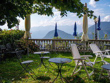 Tables And Chairs On A Terrace At Mount Sighignola, On The Border Between Italy And Switzerland, None As Balcone D'Italia