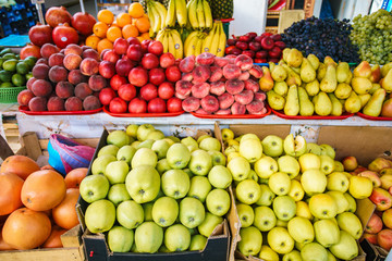 Sticker - Fresh, juicy fruits at a market under the open sky