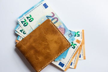 Wall Mural - Euro money in leather wallet business finance