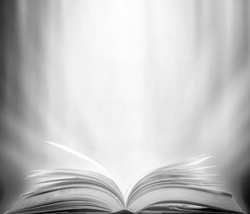 Poster - Imagine opening an old book blurred with magic power on the table and the English alphabet floating above the book with magic light as a beautiful background design.