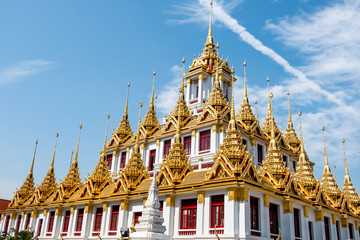 Temple roof in Bangkok Thailand. Blue sky blackgroud.