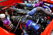 Close Up Colorful Details Of Car Engine. Modification Of The Turbo Engine  