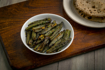 Wall Mural - Indian masala fried bhindi or Okra or Ladyfinger with Chapati