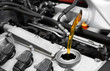 Synthetic motor oil pouring, fresh motor oil
