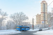Moscow after snowfall in winter, Russia. Tram goes on street covered snow.