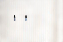 White Wall Of Wooden Slats With Two Hangers, Planks Pattern Background, Texture Of Wood Lath Wall
