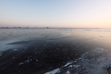 beautiful winter view of the icy river