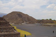 Popular tourist landmark destination ancient Aztec city ruins of the pyramids of Teotihuacan close to Mexico City with the Pyramid of the Sun and the Pyramid of the Moon and prehistoric stone walls