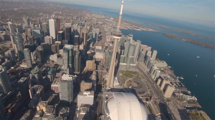 Wall Mural - 4K Aerial Sequence of Toronto, Canada - The CN Tower during the Day as seen from a helicopter