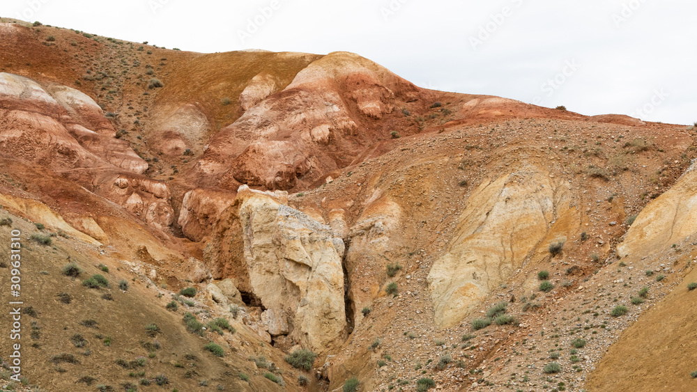 Red Desert Ravines canyon with red sandy slopes. Desert hills with soil erosion, formation ...