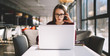 © GalakticDreamer - Contemplative pensive female journalist in eyeglasses using modern notebook for watching videos online via application, serious clever woman studying web courses concentrated while sitting at cafe