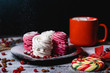 Handmade air russian fruit pink and white marshmallow on a black background. Homemade Sweets.