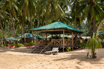 Shelter from the sun with sun loungers on the beach of El Nido Palawan Philippines