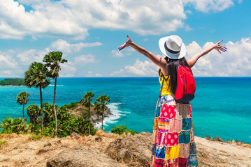 Wall Mural - Traveler woman joy relaxing hand up happy at Phromthep cape famous place Phuket, Happy fun girl look scenery nature landscape view, Beautiful destination Asia, Tourism Thailand summer holiday vacation